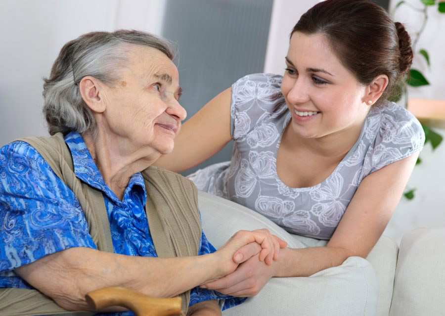 A young women visiting her granmother