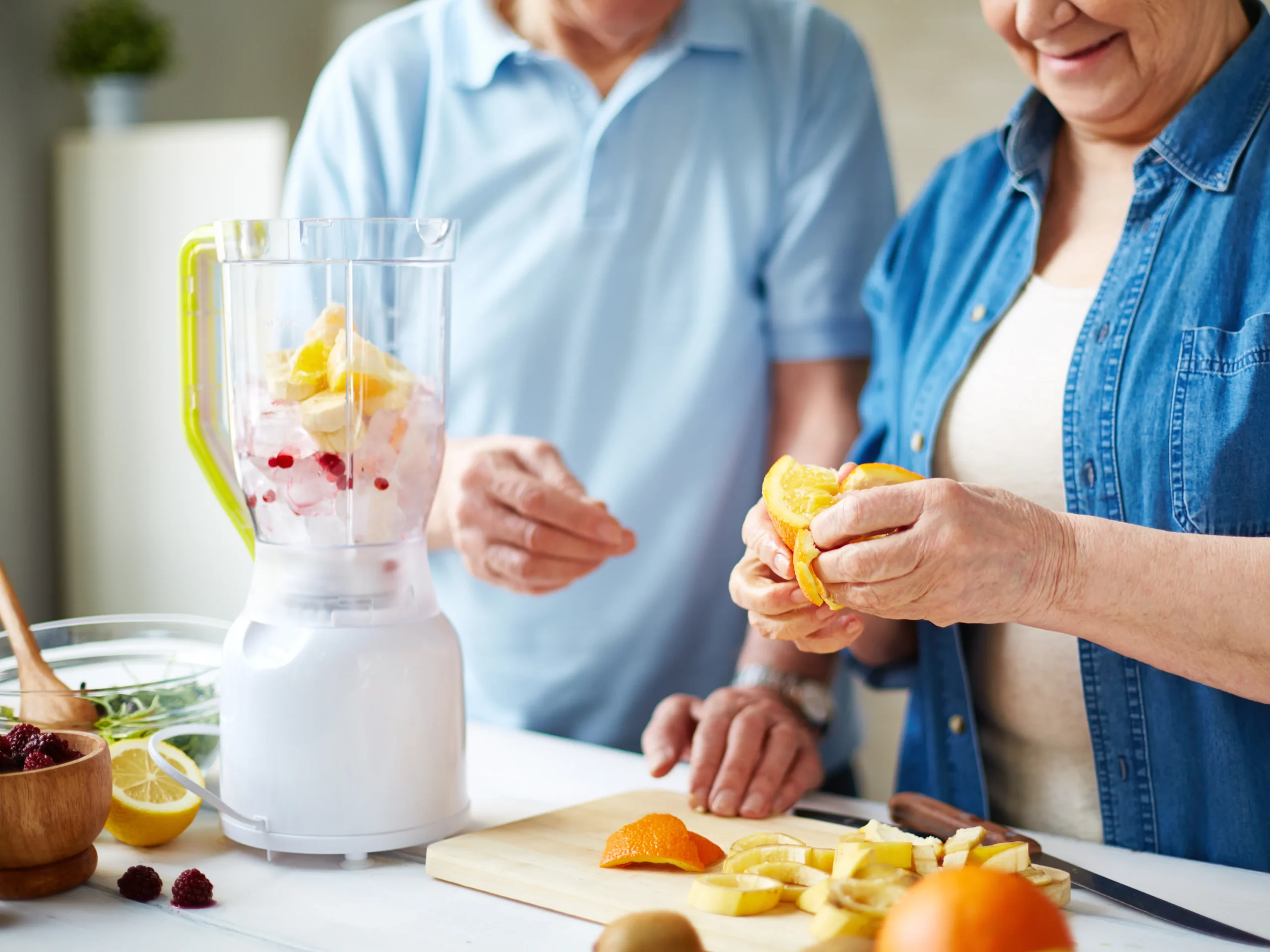 elderly people making smoothies as one of the soft food ideas for the elderly